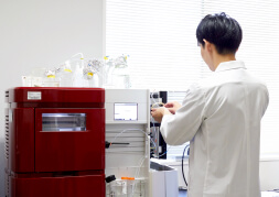 Male researcher using advanced laboratory equipment