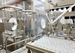 Vials lined up on a filling machine